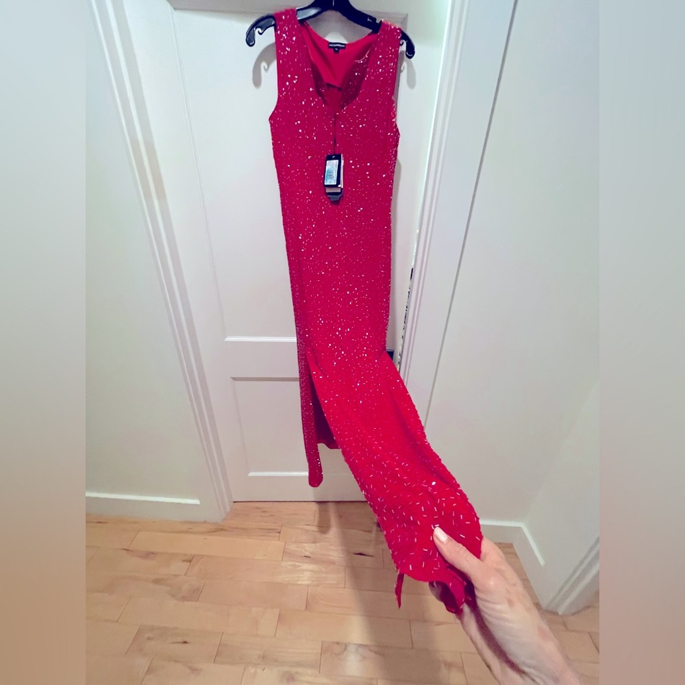 Georgio Armani elegant red beaded gown.